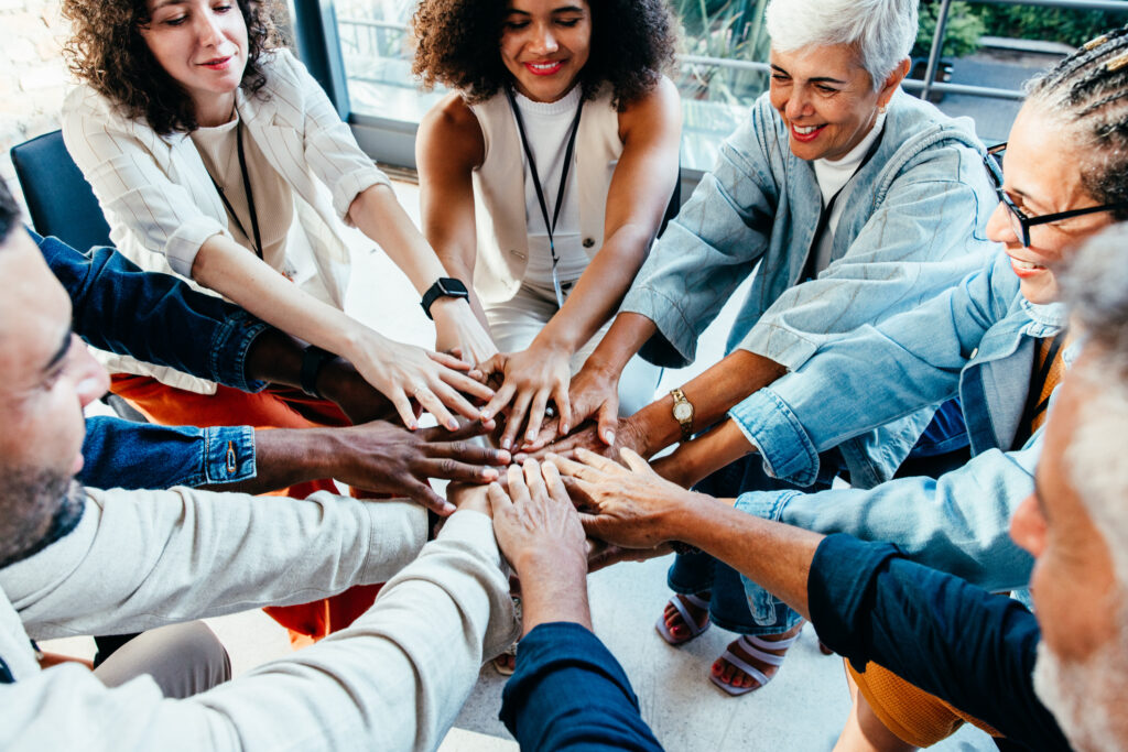 team unity in the workplace with diverse business colleagues collaborating in the office team unity in the workplace with diverse business colleagues collaborating in the office